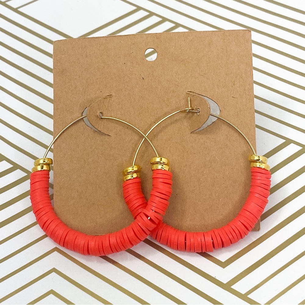 Gold earrings orange clay beaded